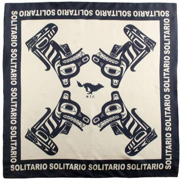 black and tan silk scarf with totem imagery and el solitario insignia