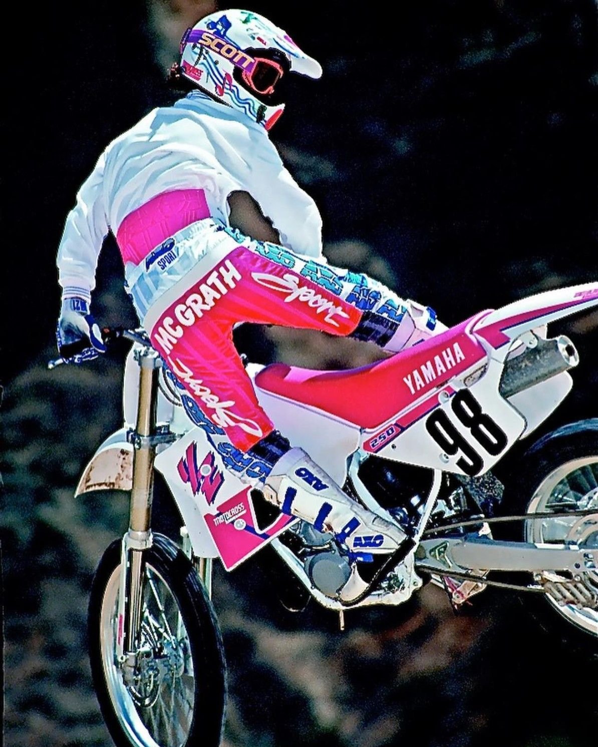 Vintage motocross rider on Yamaha YZ250 - McGrath era AXO gear